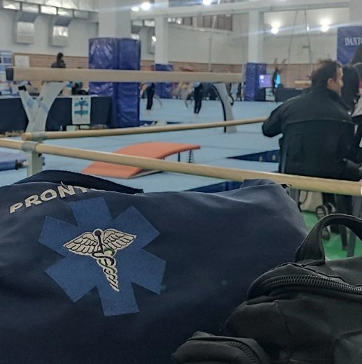 Equipo médico de Pronto Socorro en una competencia de gimnasia